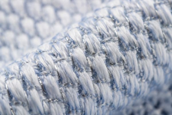 Close-up of silver ion antibacterial fabric used in safety shoe lining
